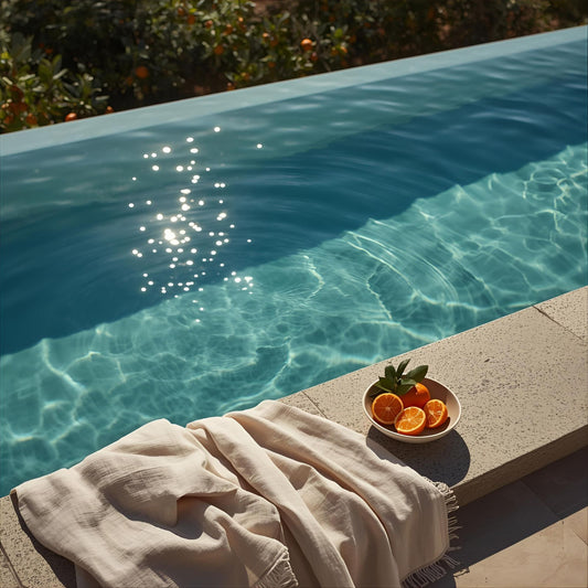 Drift State extrait de parfum — a luminous reinterpretation of Louis Vuitton Afternoon Swim. Mandarin, bergamot, orange, and ambergris. A sunlit infinity pool with citrus slices, linen textures, and kinetic water ripples, evoking freshness, motion, and olfactive clarity. A unisex scent of breath, brightness, and radiant presence.