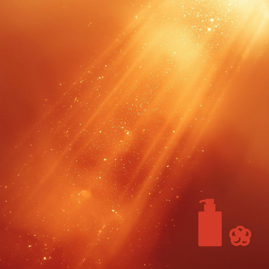 Warm orange glowing background with scattered light particles, with a small red pump‑bottle icon and a flower‑shaped icon in the lower right corner.