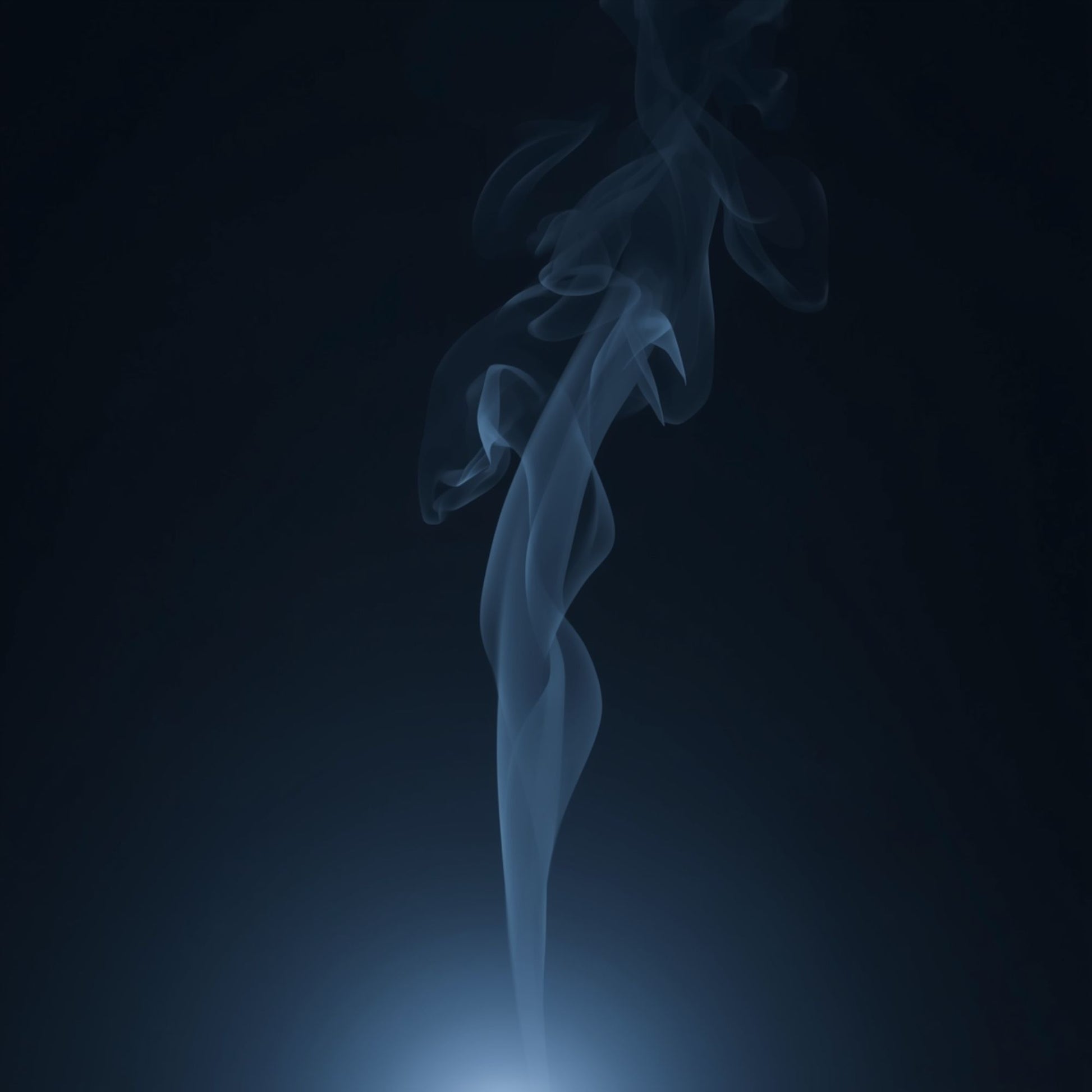Silver Livani candle hero image with cool moonlit glow and rising smoke on a dark background