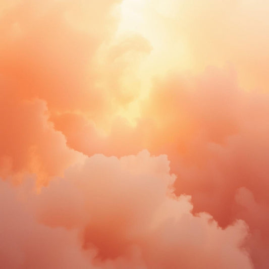 Warm peach‑pink clouds glowing with soft golden light, evoking the sweet, intimate mood of Soft Confession, the soap inspired by Kilian Love Don’t Be Shy.