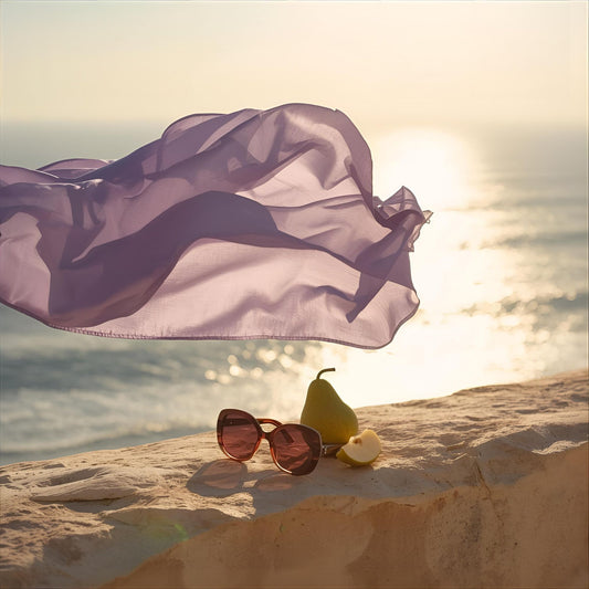 Violet Current extrait de parfum — a fresh reinterpretation of Versace Pour Femme Dylan Purple. Pear, bitter orange, freesia, Pomarose, ambroxan, cedar, and musk. Flowing lavender fabric on a Mediterranean cliffside at golden hour.